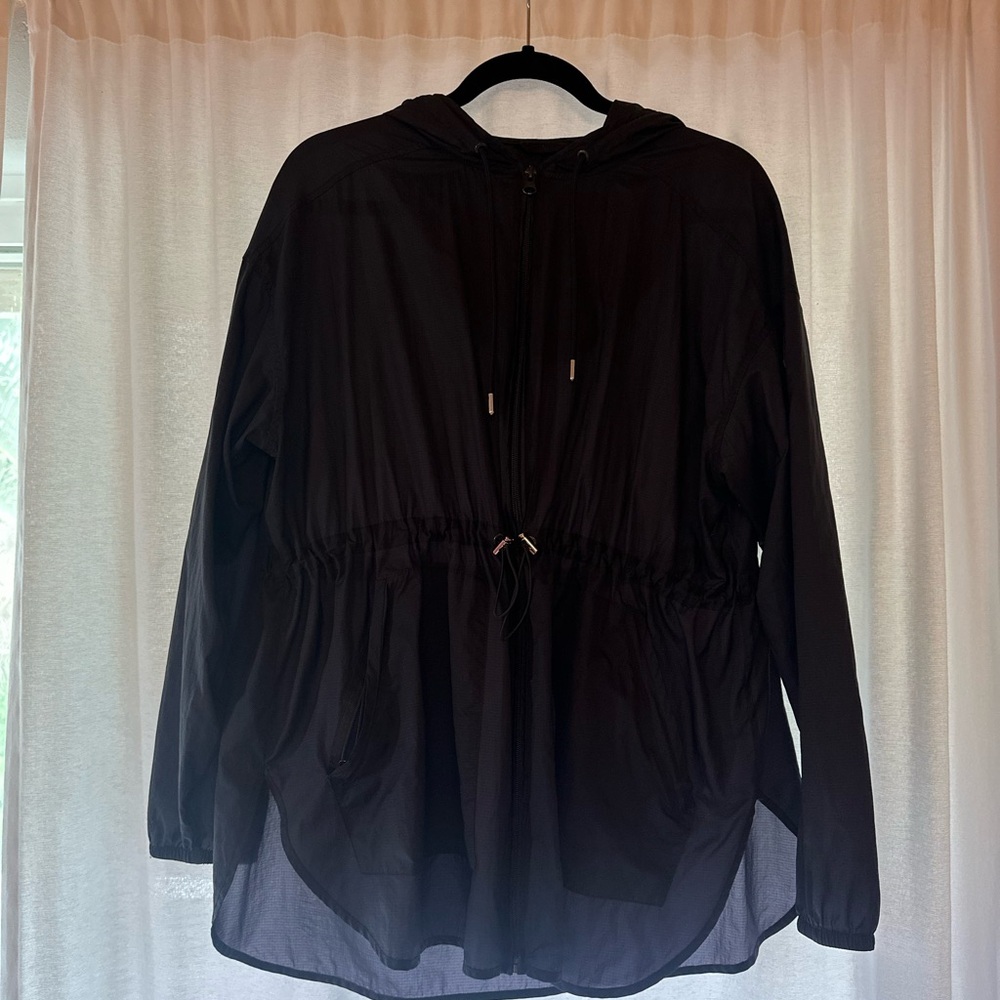 Alo Yoga Black Hooded windbreaker.